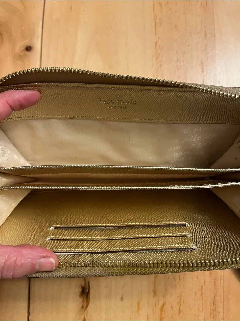 kate spade metallic gold textured zip wallet